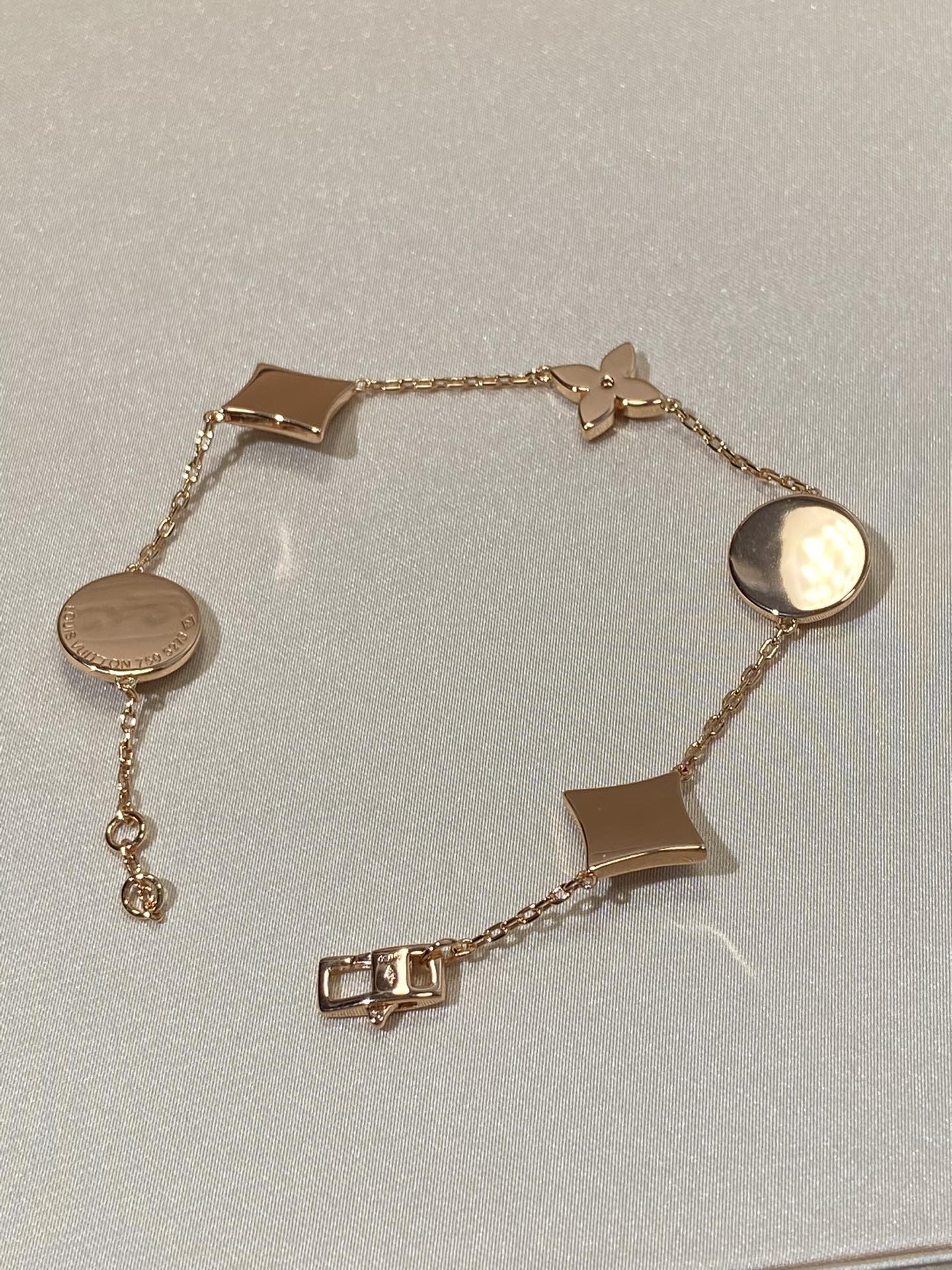 ??MIRA?¡¥STAR AND SUN 5 MOTIF MOP PINK GOLD BRACELET