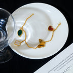 ??MIRA?¡¥LUCKY SPRING 5 MOTIF GOLD BRACELET