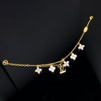 ??MIRA?¡¥LOGO 6 MOTIF STAR AND SUN GOLD BRACELET