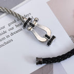 ??MIRA?¡¥FORCE LARGE HORSESHOE BLACK DIAMOND BRACELET SILVER
