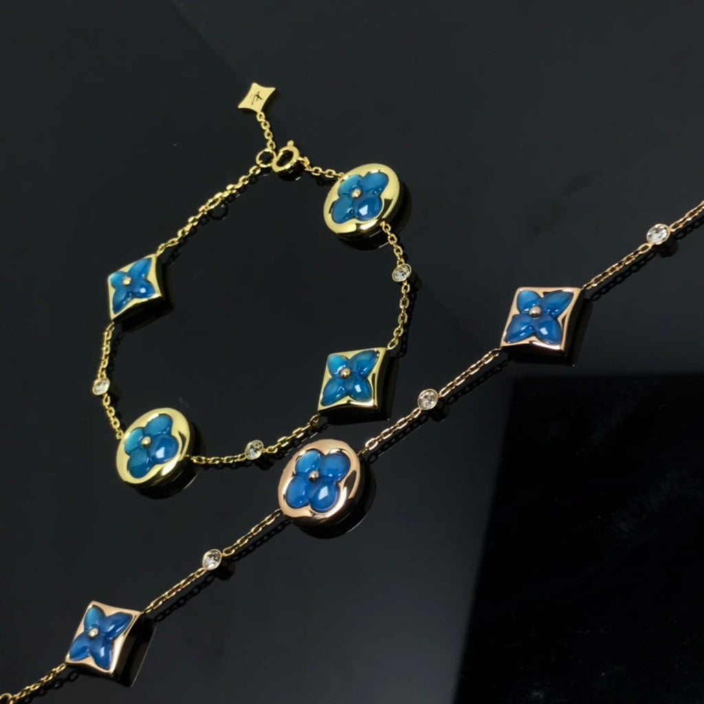 ??MIRA?¡¥STAR AND SUN 4 MOTIF BLUE BRACELET