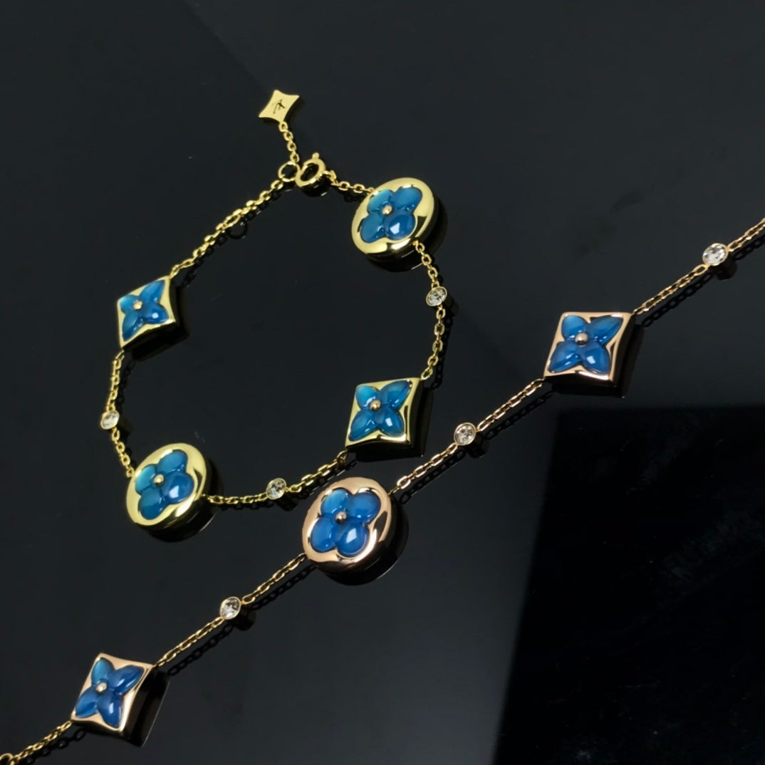 ??MIRA?¡¥STAR AND SUN 4 MOTIF BLUE BRACELET